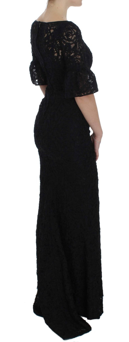 Dolce & Gabbana – Langes, figurbetontes Maxikleid aus geblümter Spitze in Schwarz