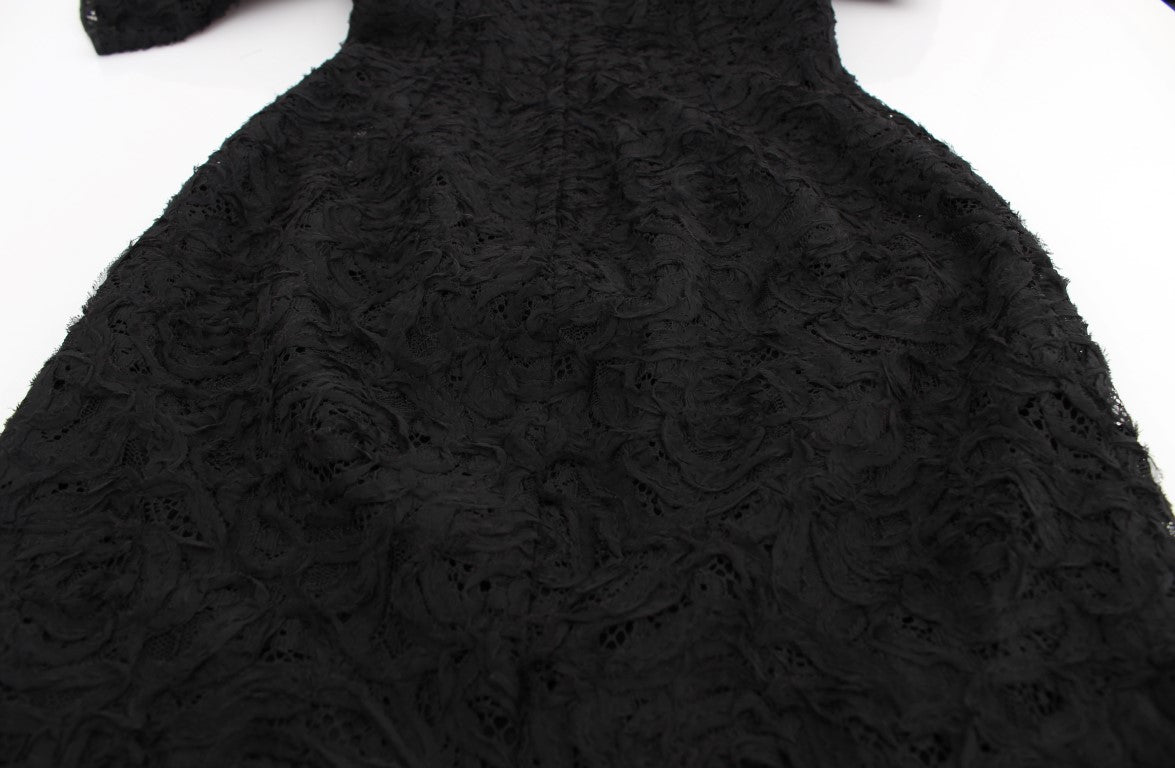 Dolce & Gabbana – Langes, figurbetontes Maxikleid aus geblümter Spitze in Schwarz