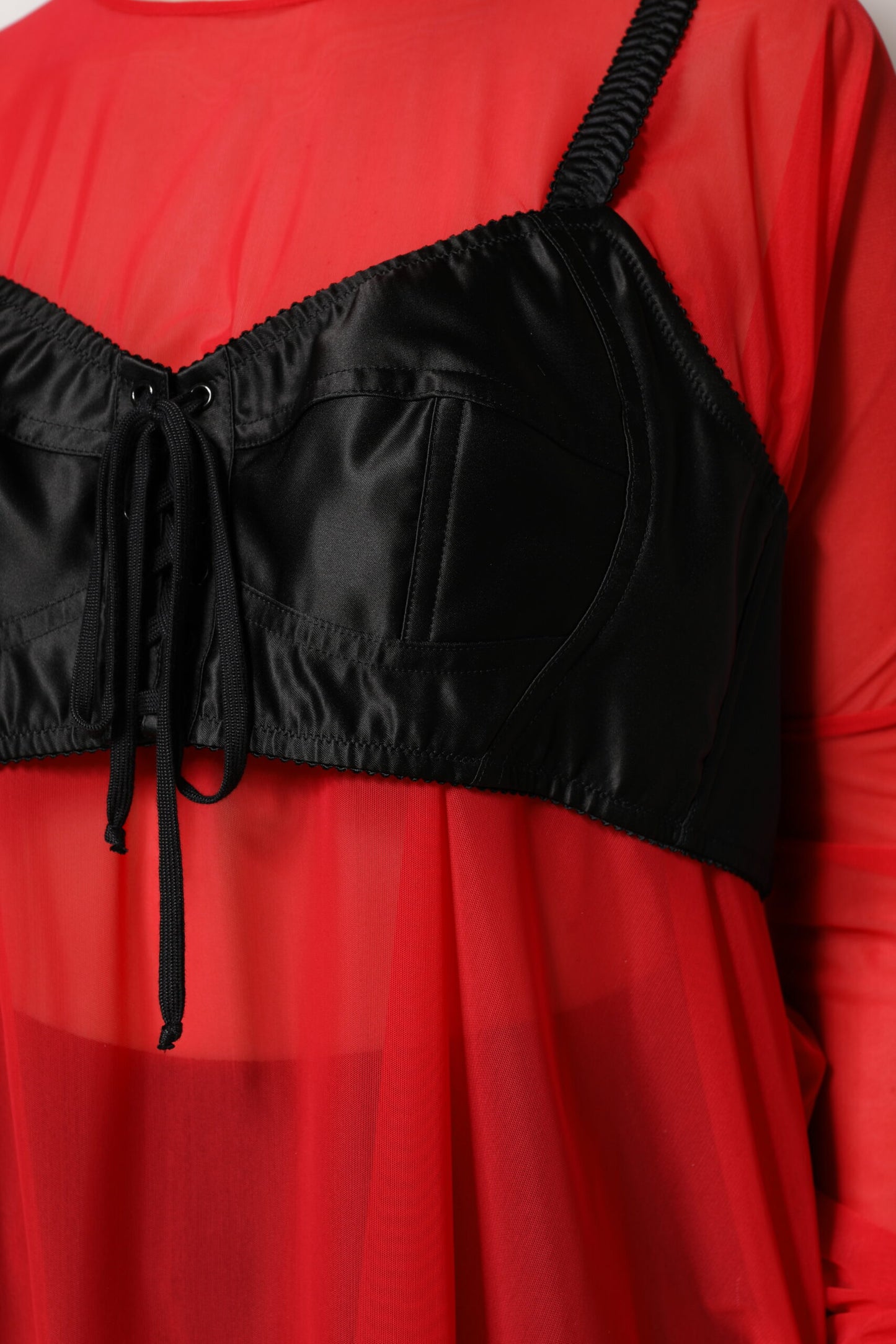 Dolce & Gabbana – Rot-schwarzes Oberteil mit langen Ärmeln und Bustier-Detail