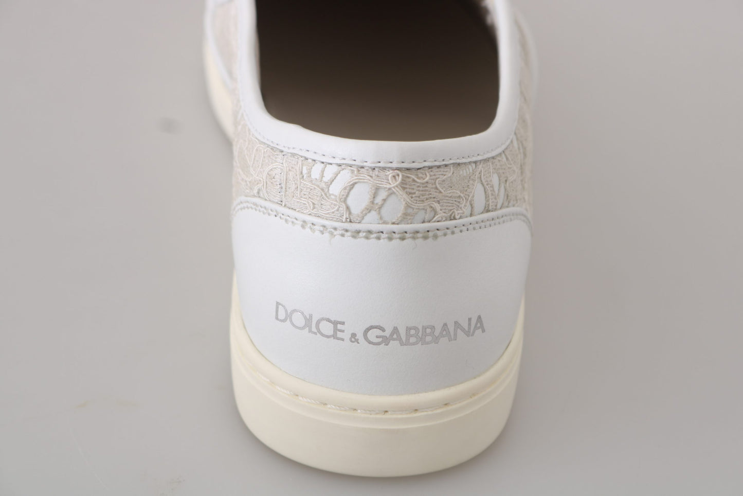 Dolce & Gabbana – Slipper aus weißem Leder mit Spitze