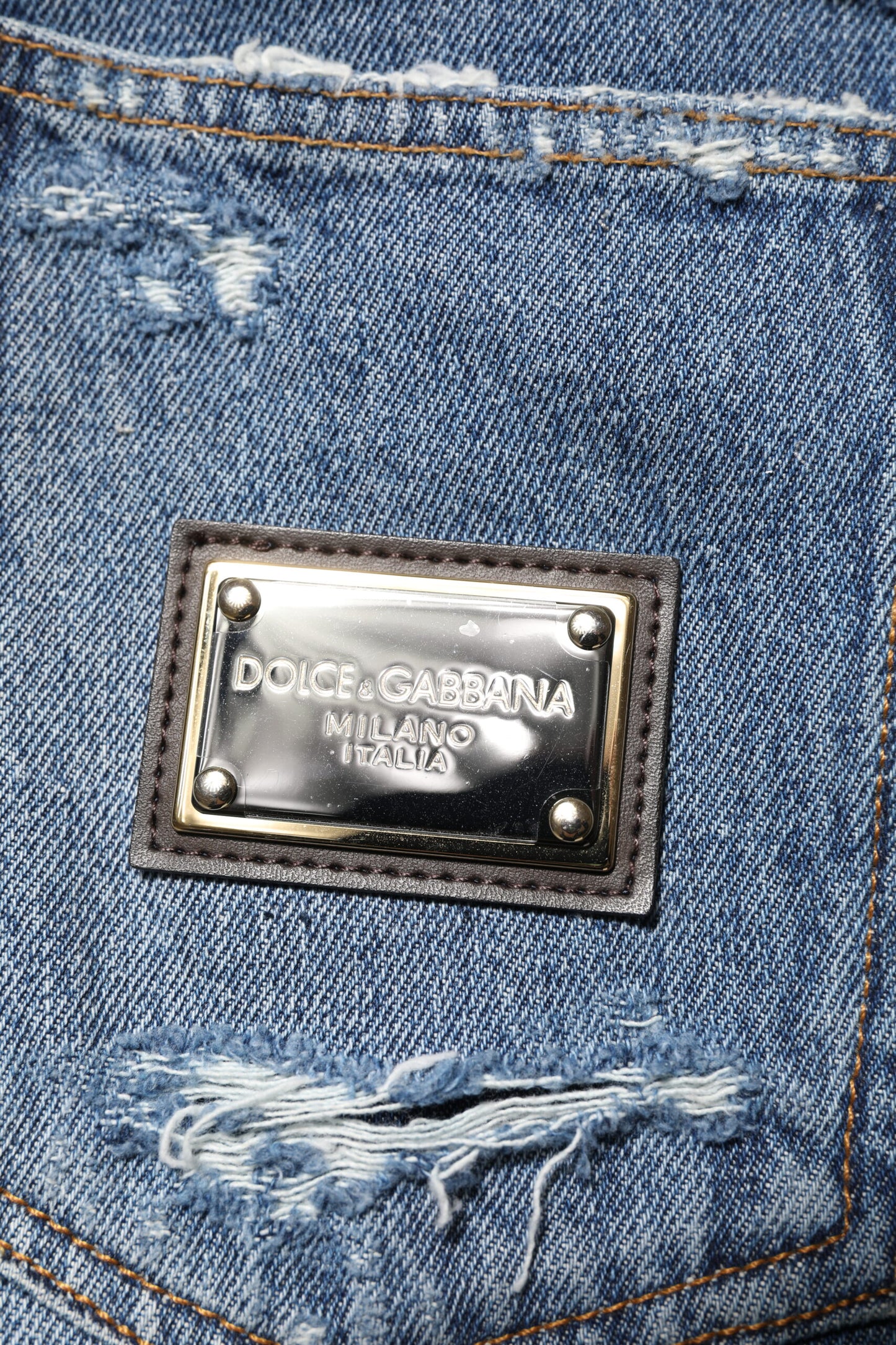 Dolce & Gabbana Blaue Jeans aus zerfetzter Baumwolle mit Logo-Plakette