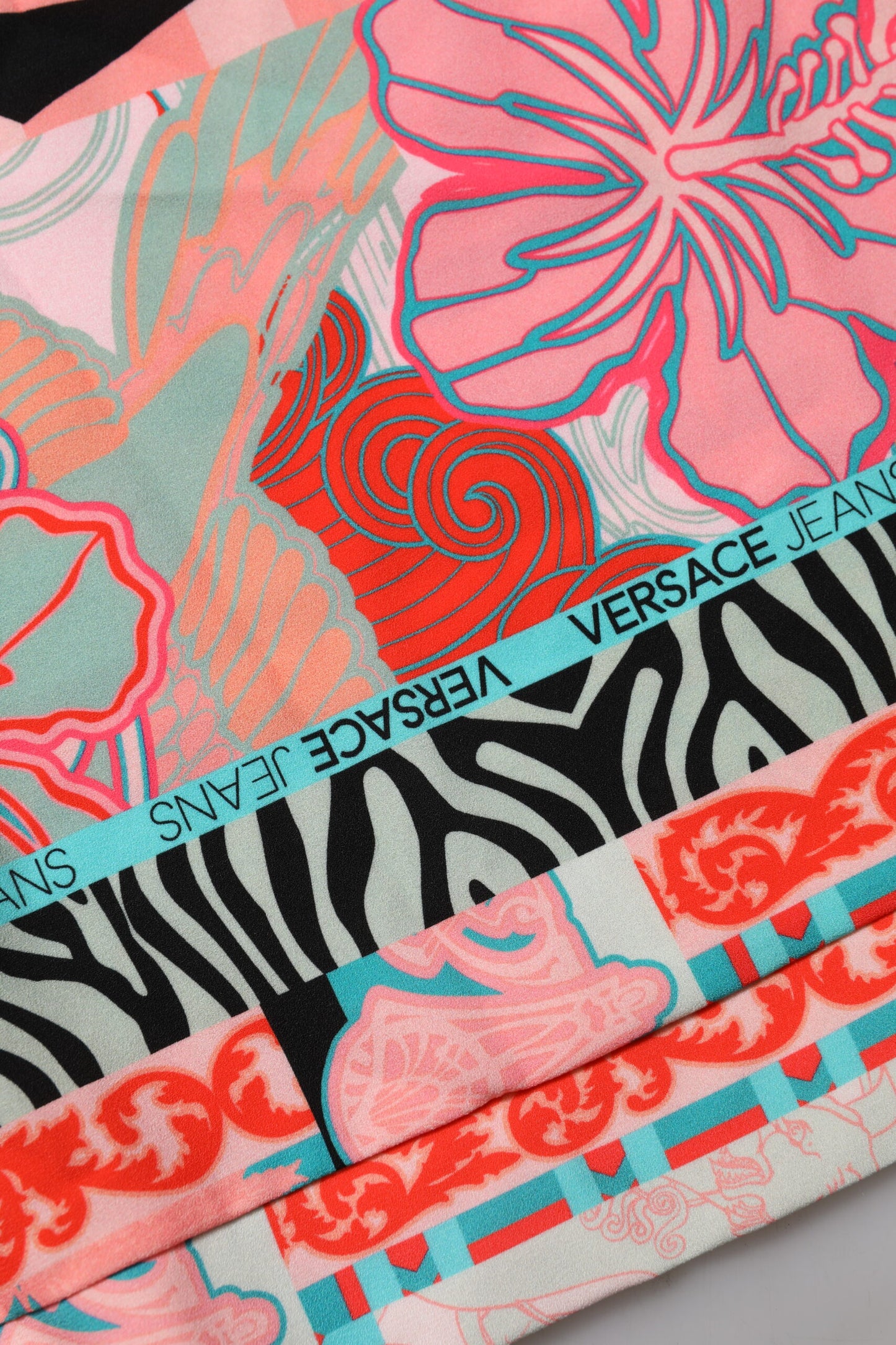 Versace Jeans – Bluse mit mehrfarbigem Print und kurzen Ärmeln für Damen