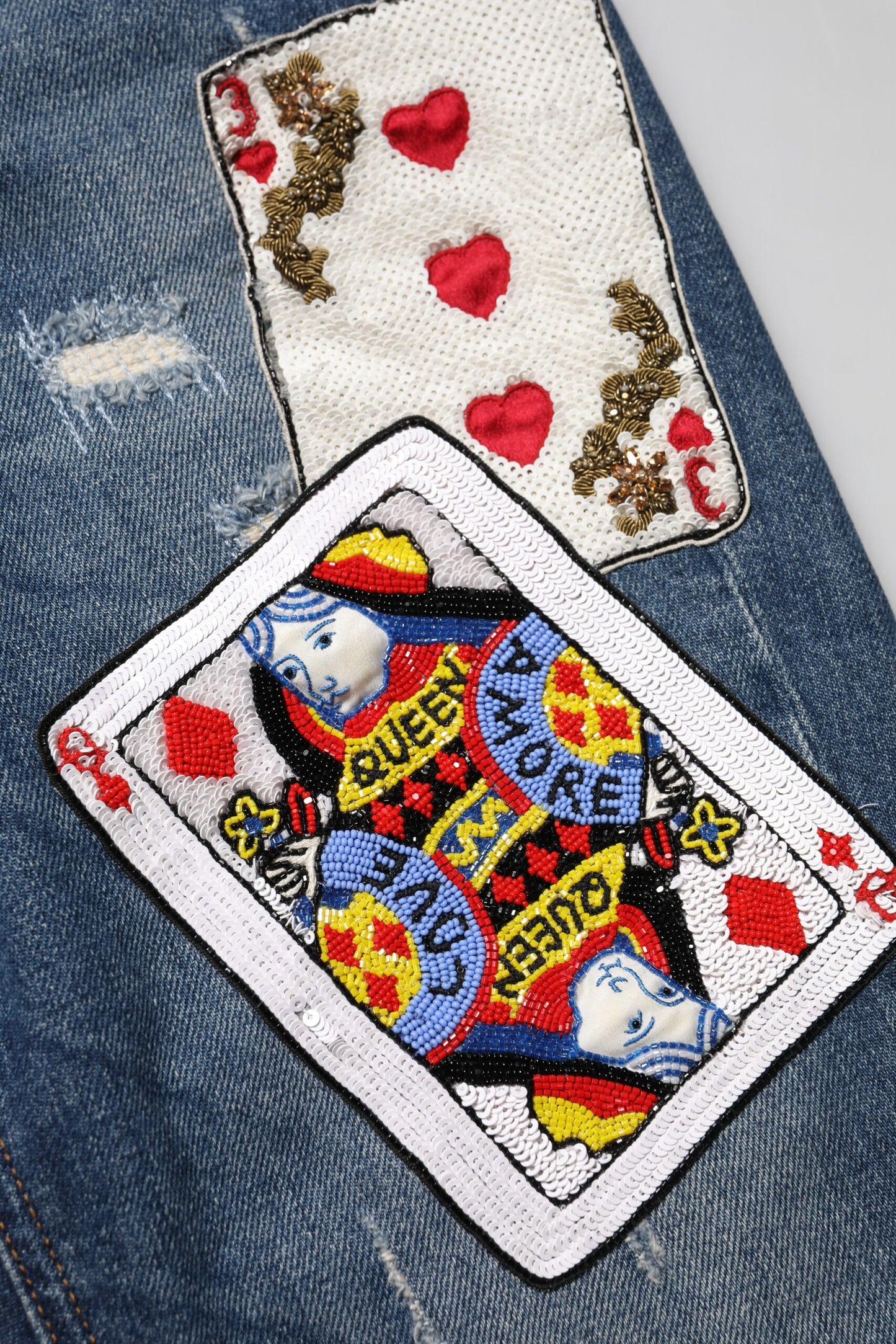 Dolce & Gabbana – Blaue Skinny-Jeans mit Spielkartenstickerei
