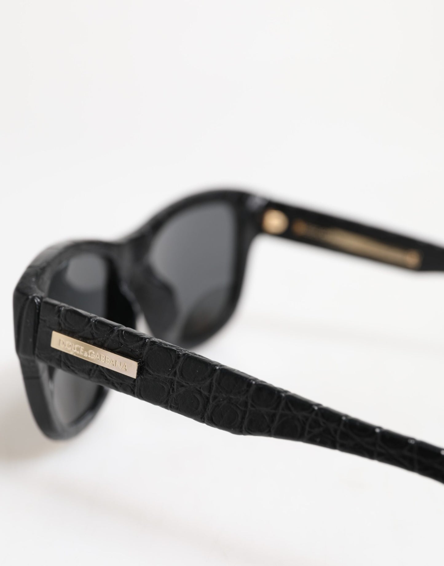 Dolce & Gabbana – Sonnenbrille mit getönten Gläsern und schwarzem Lederrahmen DG4177