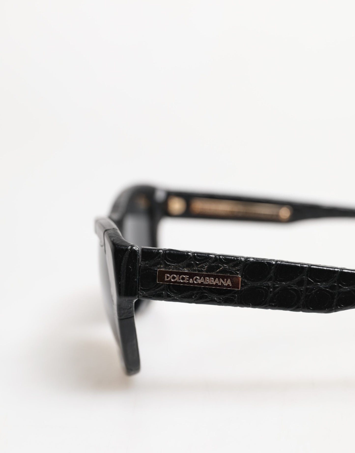 Dolce & Gabbana – Sonnenbrille mit getönten Gläsern und schwarzem Lederrahmen DG4177
