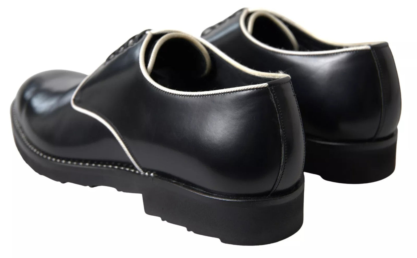 Dolce & Gabbana – Formelle Abendschuhe aus schwarzem und weißem Leder