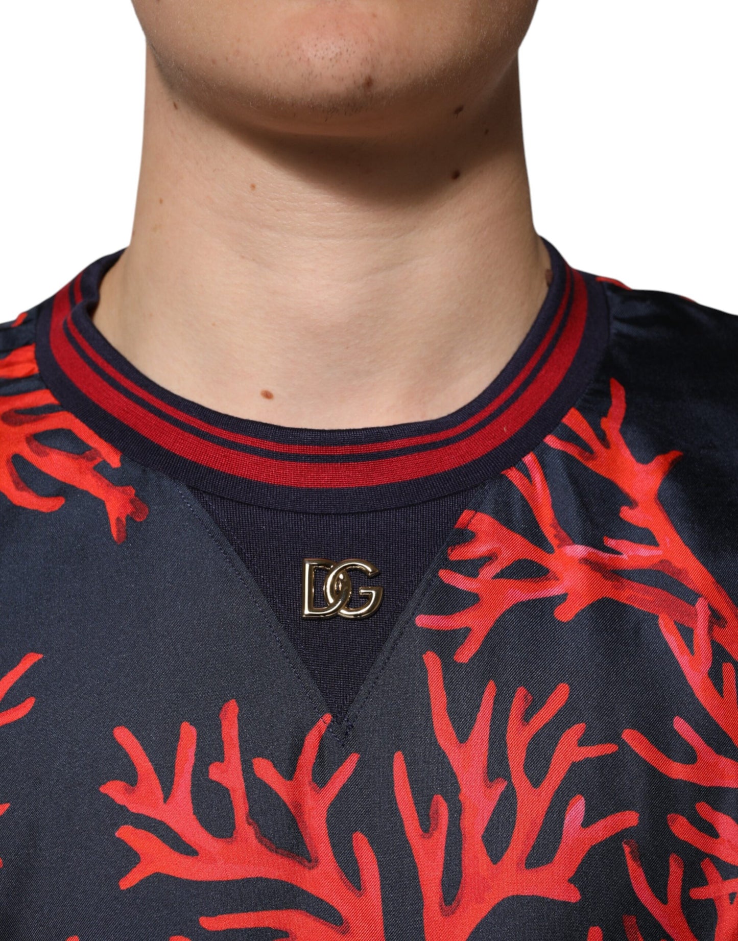Dolce & Gabbana Marineblauer Pullover aus Seide mit Korallendruck