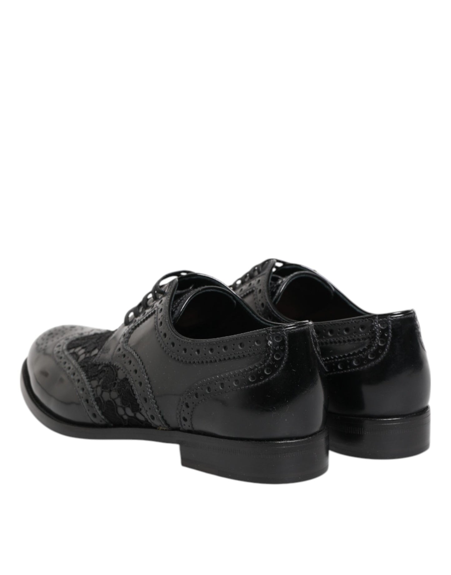 Dolce & Gabbana – Formelle Schuhe aus schwarzem Leder mit floraler Spitze