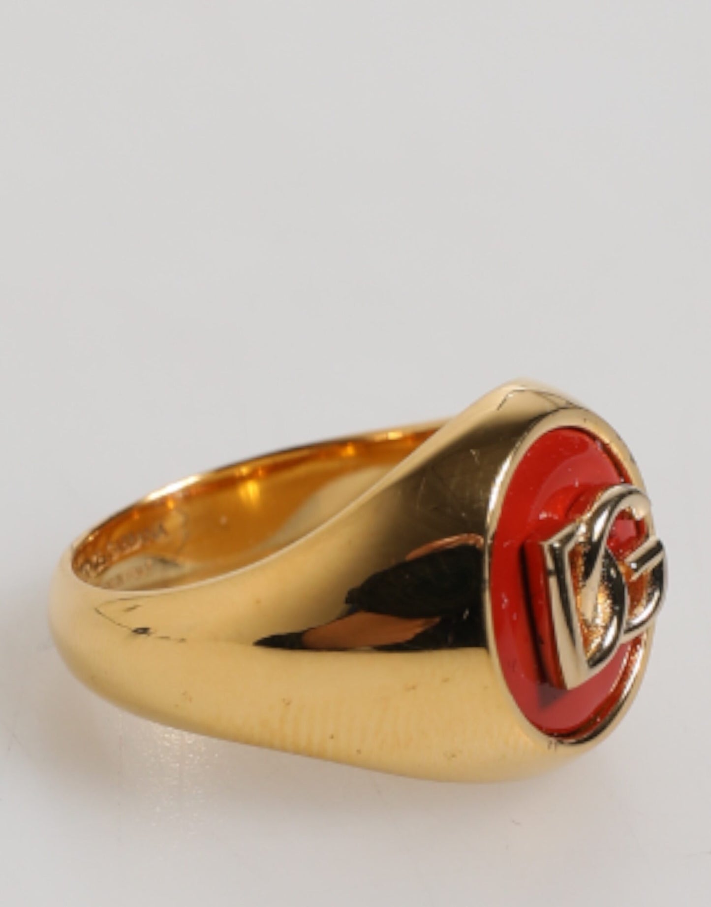 Dolce & Gabbana Herrenring aus echtem Messing in Goldton mit rotem DG-Logo