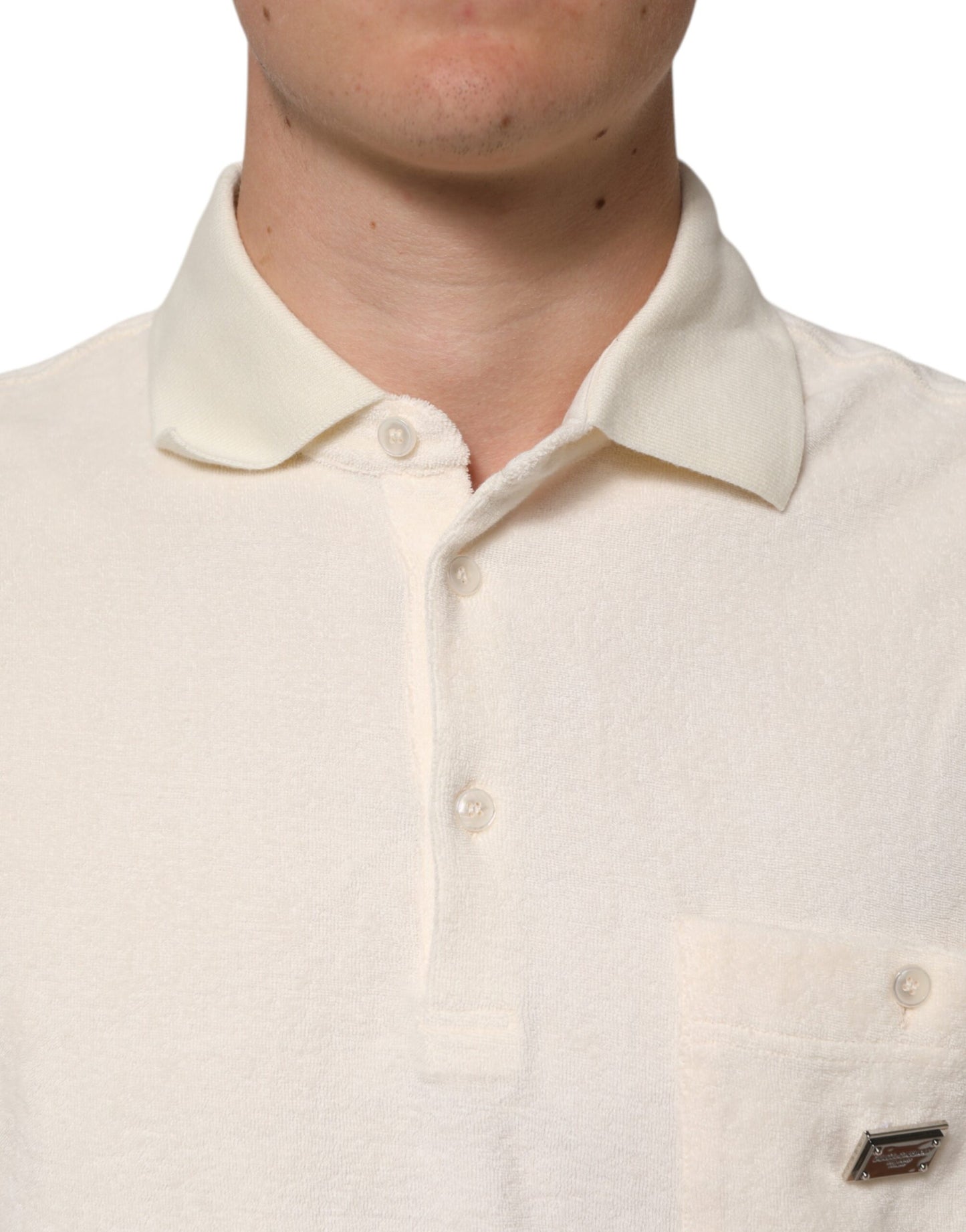 Dolce & Gabbana – Elfenbeinfarbenes Poloshirt aus Baumwollfrottee mit Logotasche