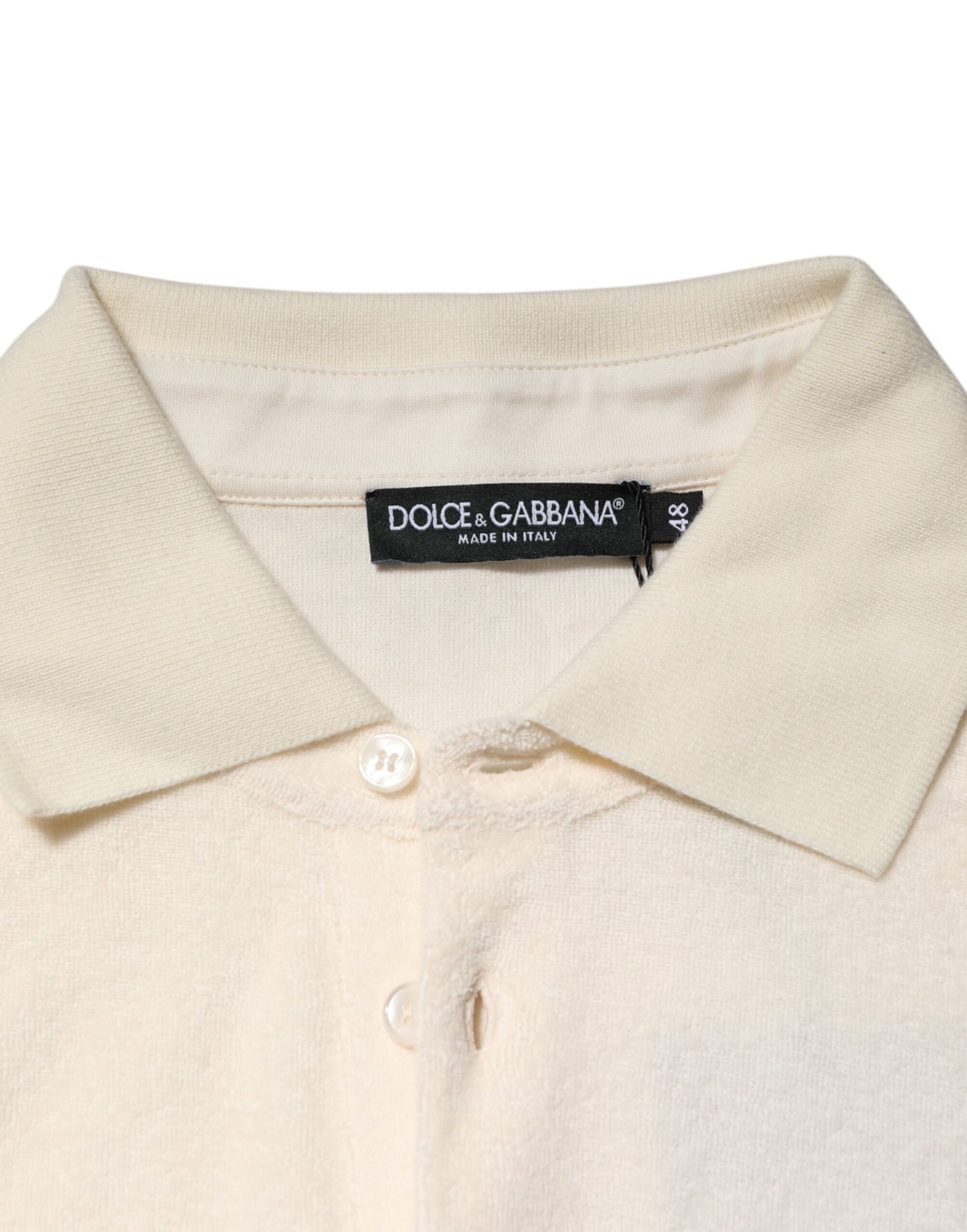 Dolce & Gabbana – Elfenbeinfarbenes Poloshirt aus Baumwollfrottee mit Logotasche