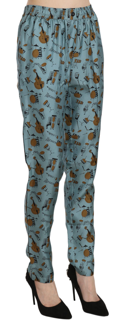 Dolce &amp; Gabbana – Karottenhose mit Musikinstrumenten-Print in Blau