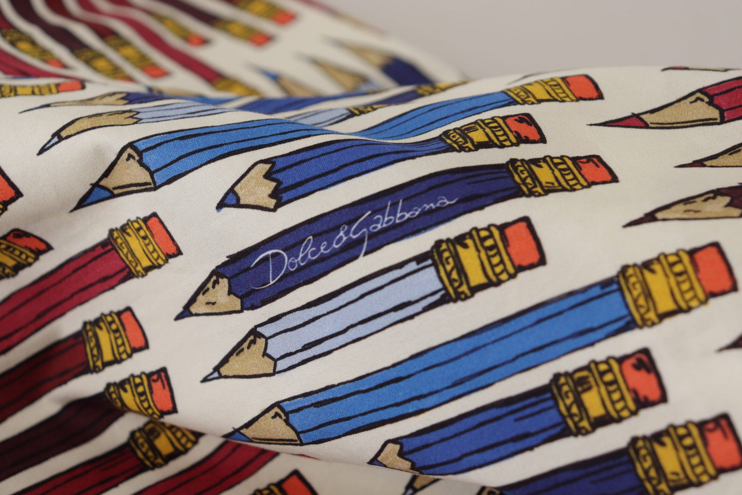 Dolce &amp; Gabbana – Weiße T-Shirt-Bluse aus Baumwolle mit Bleistiftdruck