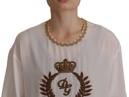Dolce &amp; Gabbana Blusentop aus weißer Seide mit goldener DG-Krone und Kristallen