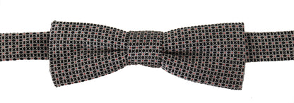 Dolce &amp; Gabbana – Schwarz-weiße Seidenkrawatte mit Blumenmuster und Papillon-Muster