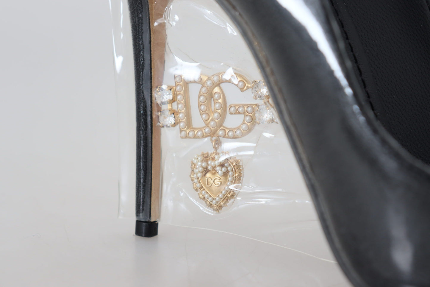 Dolce &amp; Gabbana Schwarze Pumps aus Leder mit Kunststoffummantelung