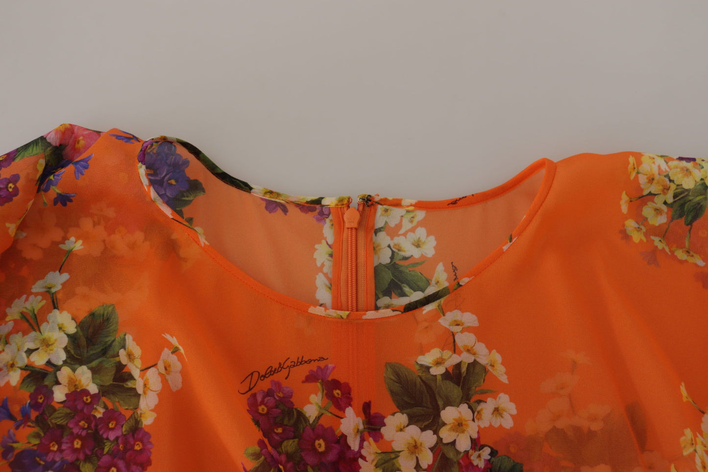 Dolce &amp; Gabbana – Orangefarbene Bluse mit Blumenmuster und langen Ärmeln