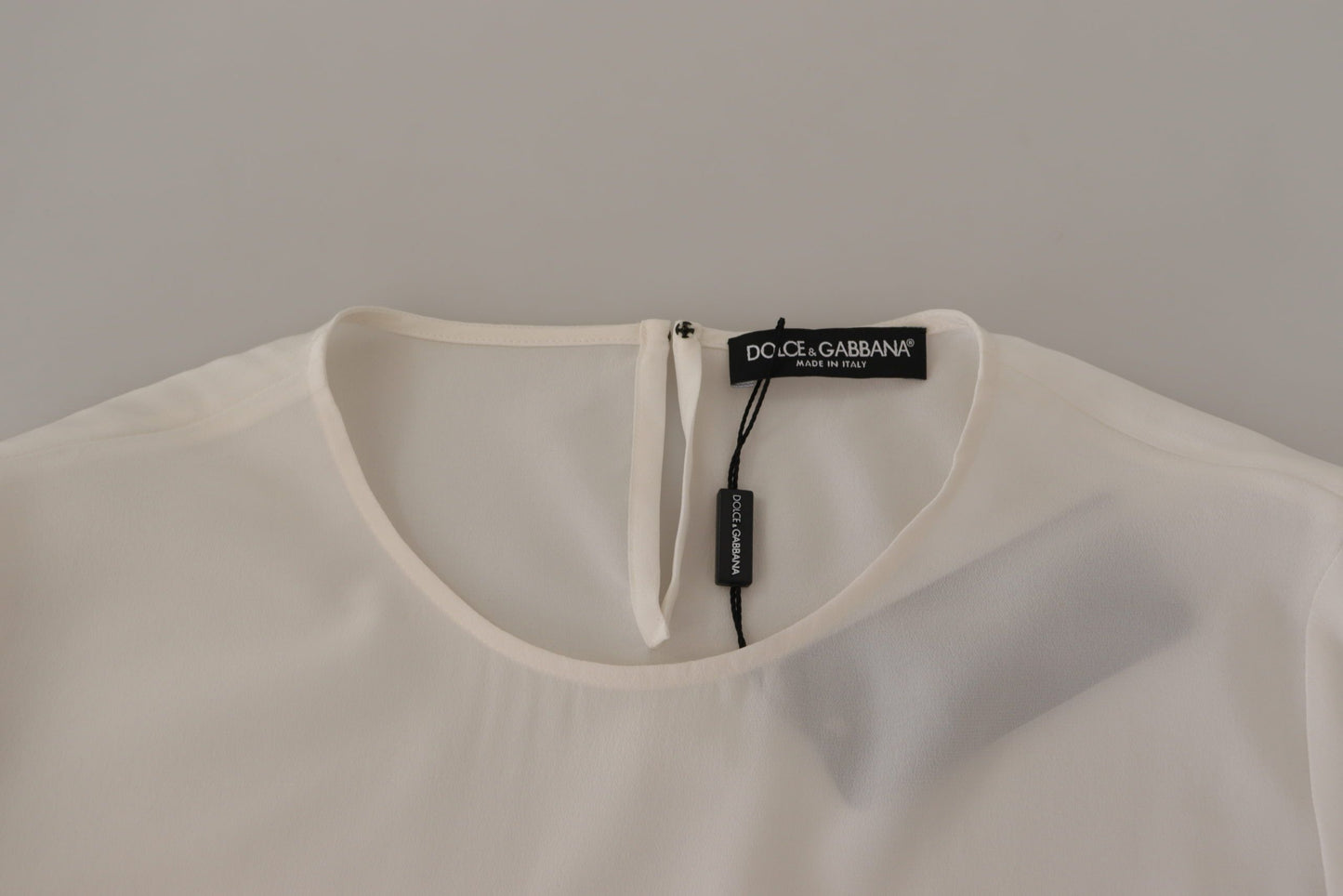 Dolce &amp; Gabbana – Weiße Bluse aus Seide mit DG-Logo-Stickerei und langen Ärmeln