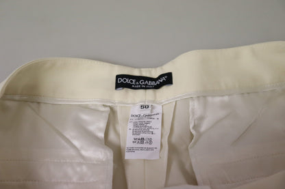 Dolce &amp; Gabbana – Elfenbeinfarbene, hoch taillierte, verkürzte Hose mit umgeschlagenem Saum