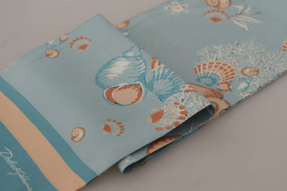 Dolce &amp; Gabbana – Blauer Seidenschal mit glänzendem Muschel-Print und Fransen