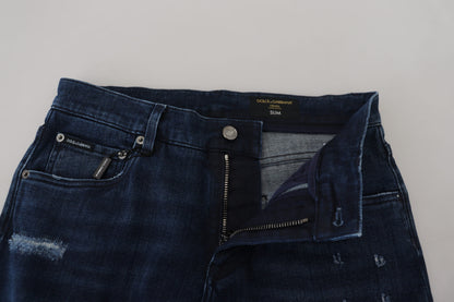 Dolce &amp; Gabbana – Skinny-Jeans aus zerfetztem Baumwoll-Denim in Blau