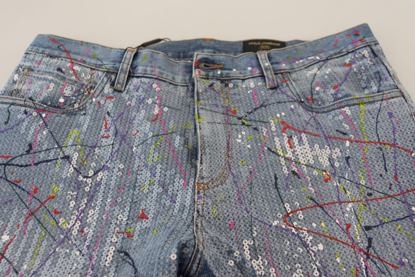 Dolce &amp; Gabbana – Blaue Jeans aus Baumwoll-Denim mit Farbspritzer-Print