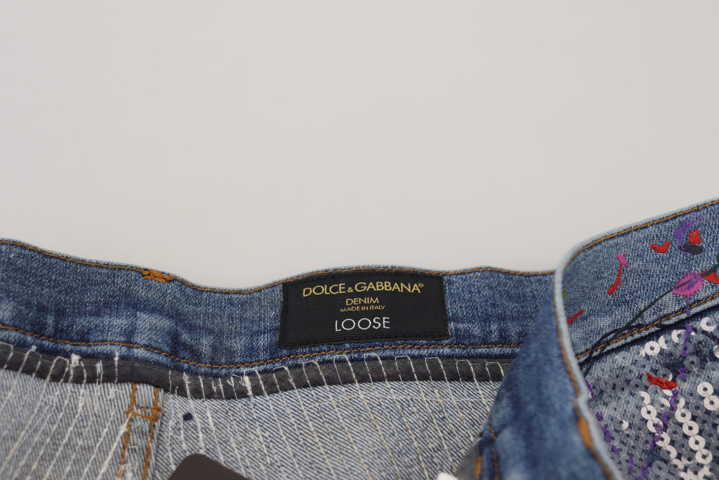 Dolce &amp; Gabbana – Blaue Jeans aus Baumwoll-Denim mit Farbspritzer-Print