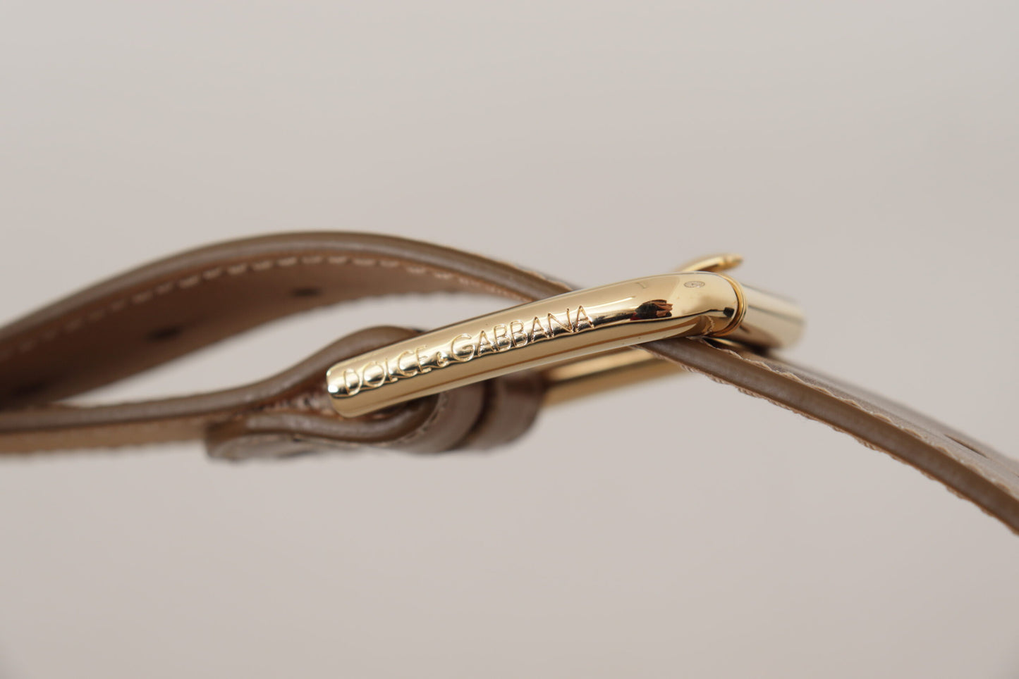 Dolce &amp; Gabbana – Gürtel aus bronzefarbenem Kalbsleder mit goldener Logo-Schnalle