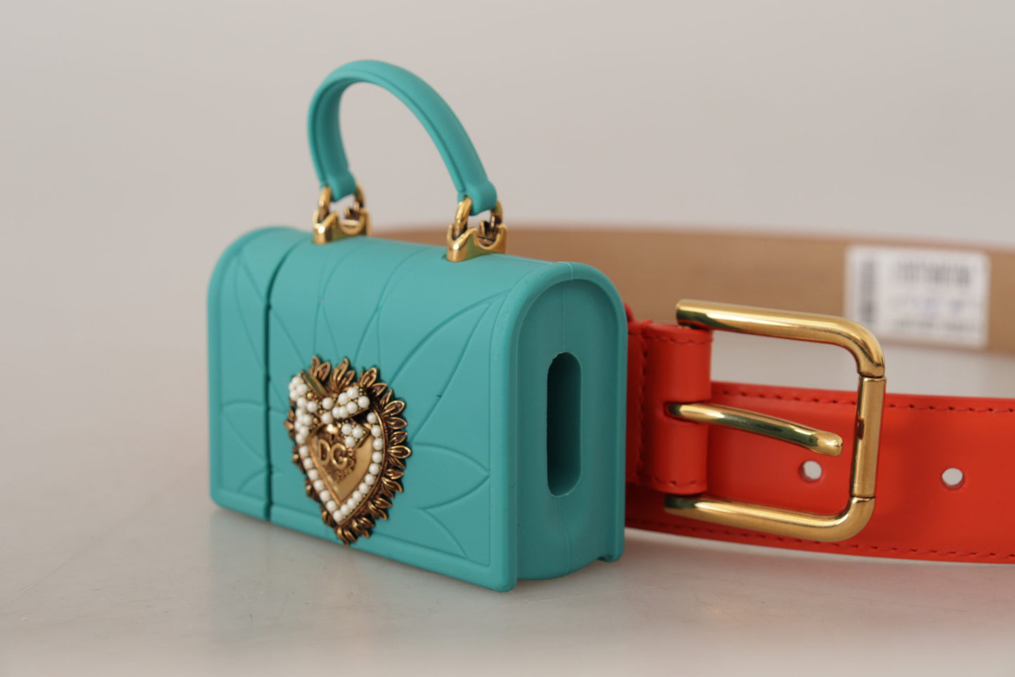 Dolce &amp; Gabbana – Devotion – Mikrotasche aus orangefarbenem Leder mit Herzmotiv und Kopfhörergürtel