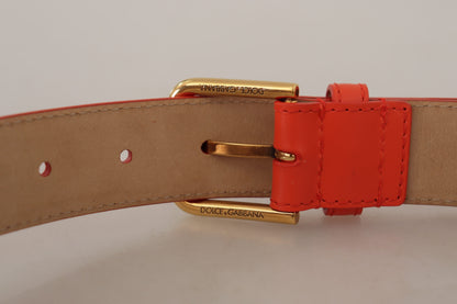 Dolce &amp; Gabbana – Devotion – Mikrotasche aus orangefarbenem Leder mit Herzmotiv und Kopfhörergürtel