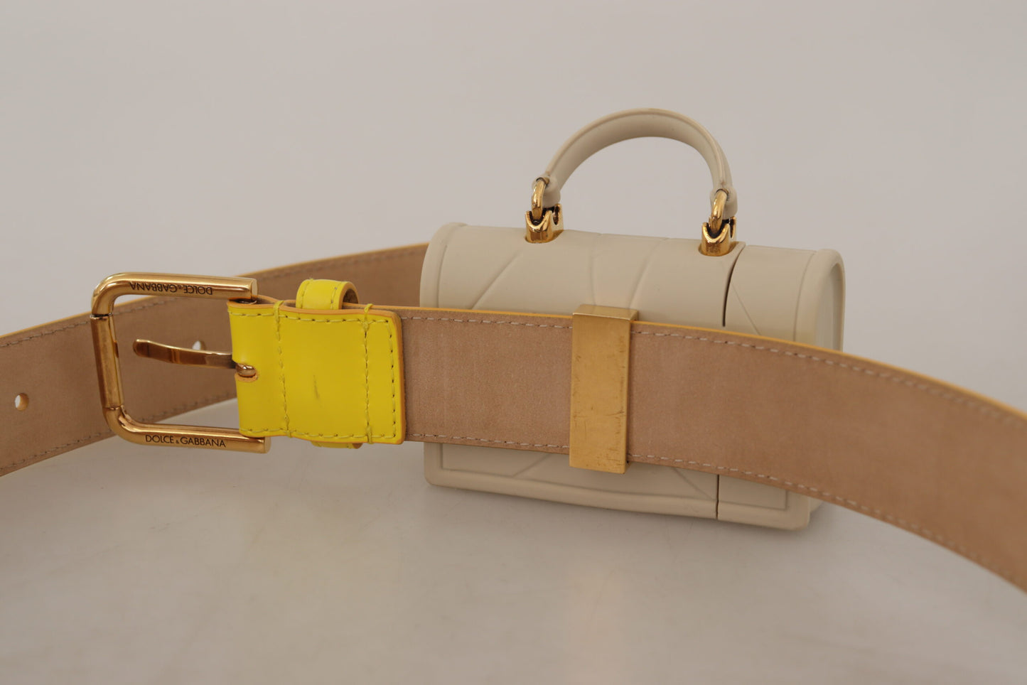 Dolce &amp; Gabbana – Devotion – Mikrotasche aus gelbem Leder mit Herzmotiv und Kopfhörergürtel