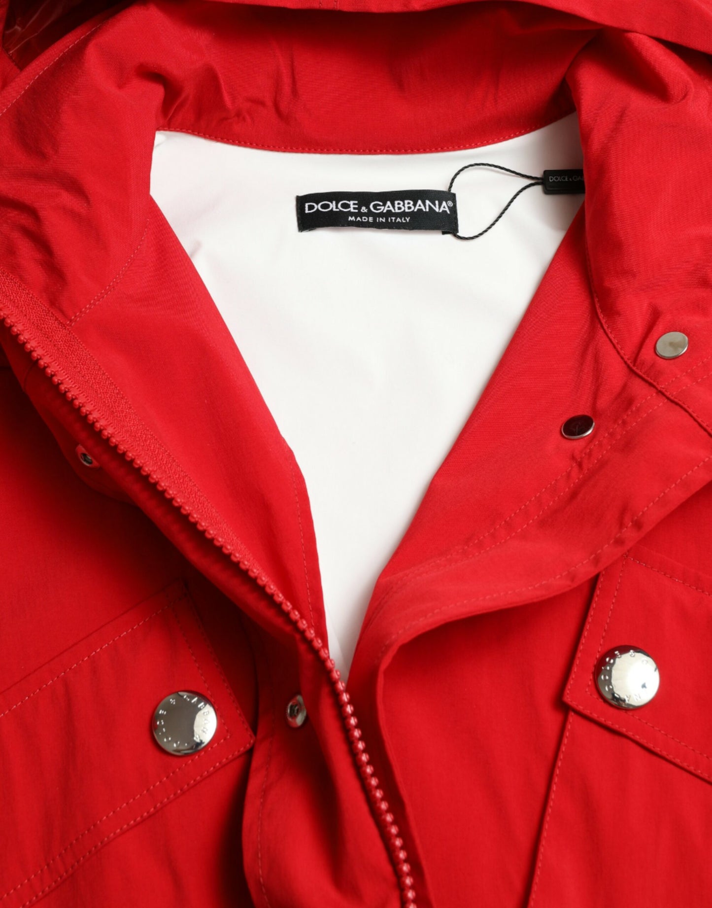 Dolce &amp; Gabbana – Regenjacke aus Polyester mit Kapuze und Knöpfen in Rot