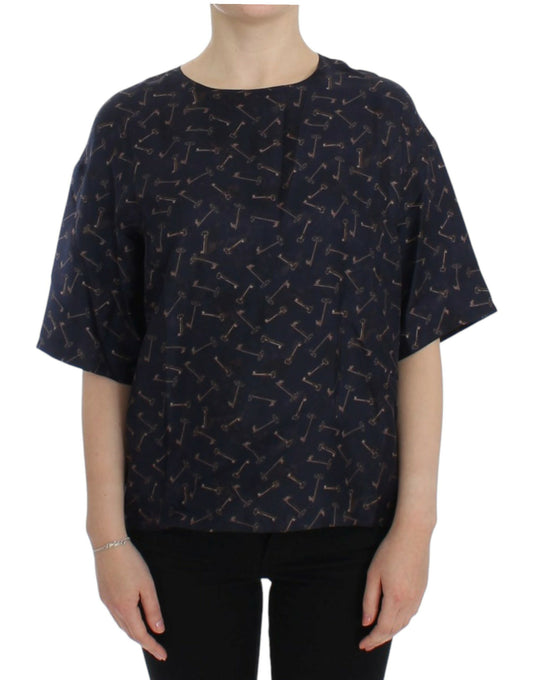 Dolce &amp; Gabbana Blaue Seidenbluse mit goldenem Schlüsseldruck