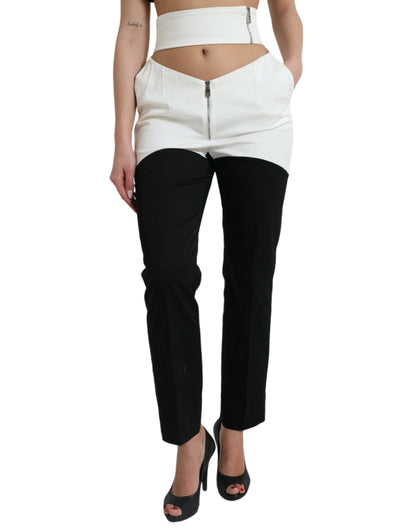 Dolce &amp; Gabbana – Schmal zulaufende Hose aus Baumwolle in Schwarz und Weiß mit Cut-Out-Taille