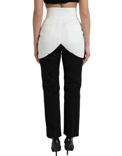 Dolce &amp; Gabbana – Schmal zulaufende Hose aus Baumwolle in Schwarz und Weiß mit Cut-Out-Taille