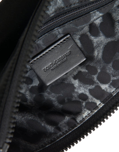 Dolce &amp; Gabbana – Schwarze Clutch aus Nylon mit Schlüsselanhänger und Logo-Plakette
