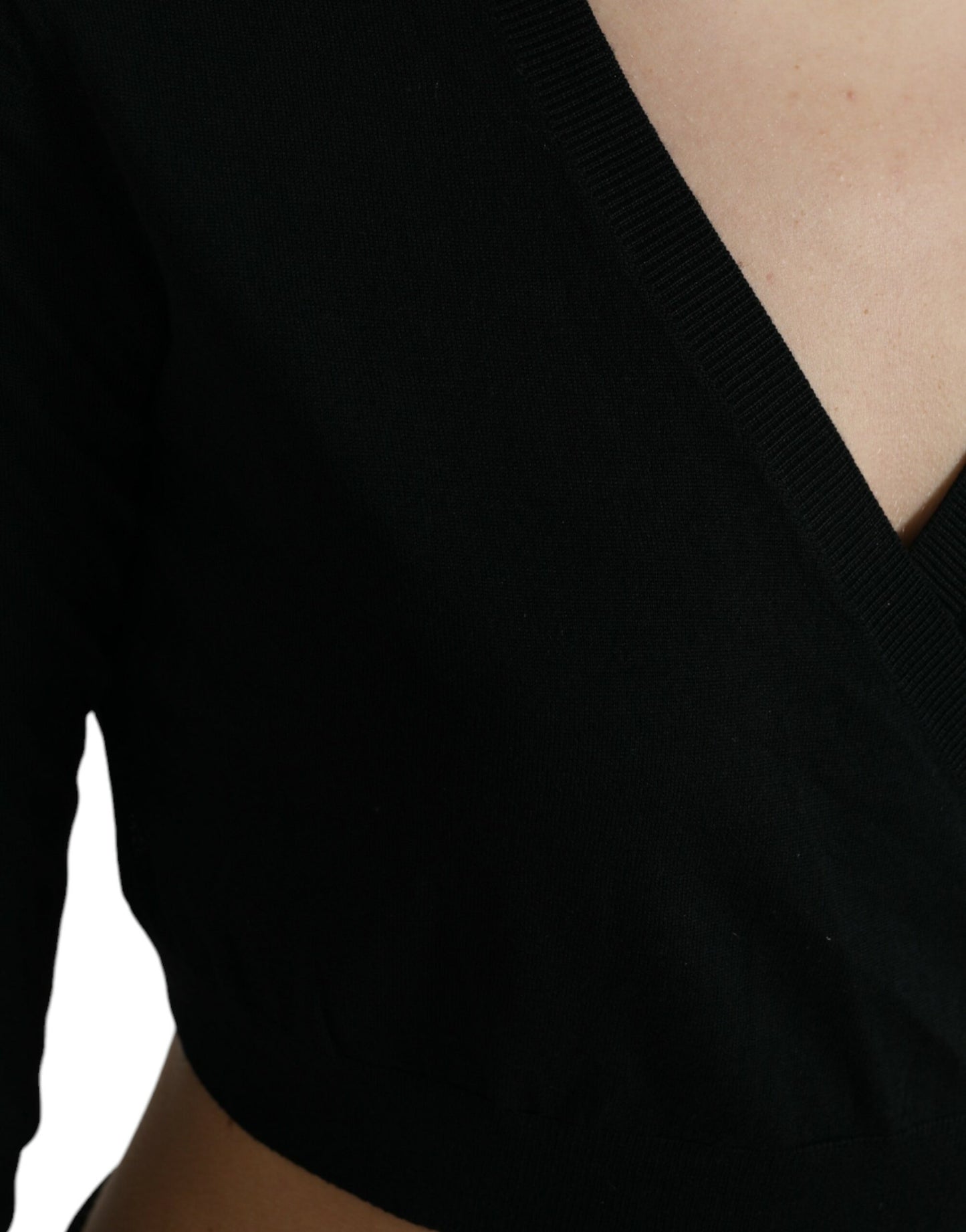 Dolce &amp; Gabbana – Schwarzer Cardigan aus Wolle mit V-Ausschnitt und gekreuztem Saum