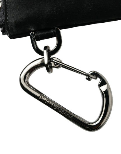 Dolce &amp; Gabbana – Schwarze Clutch aus Nylon mit Schlüsselanhänger und Logo-Plakette