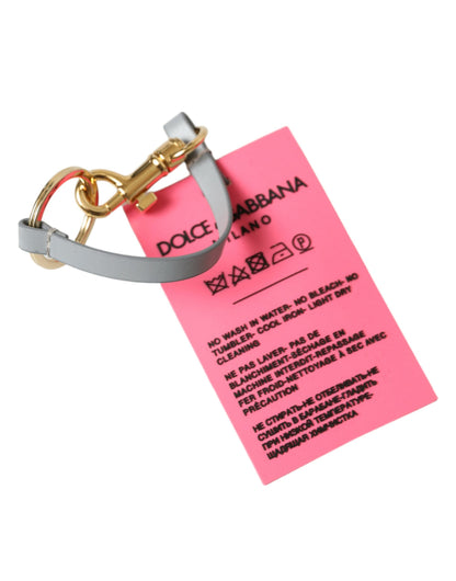 Dolce &amp; Gabbana Schlüsselanhänger aus rosa Silikon mit DG-Logo und goldenem Messing