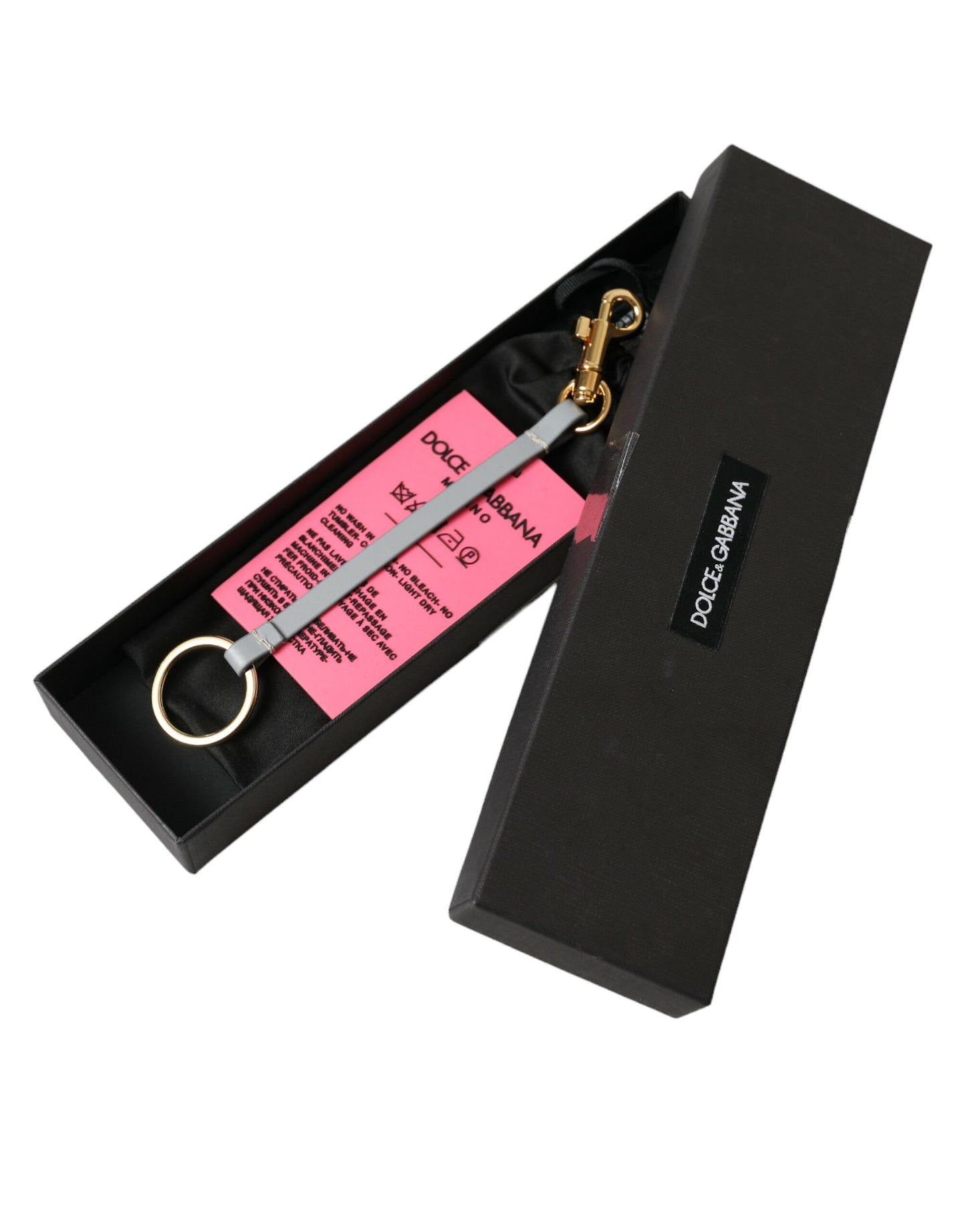 Dolce &amp; Gabbana Schlüsselanhänger aus rosa Silikon mit DG-Logo und goldenem Messing