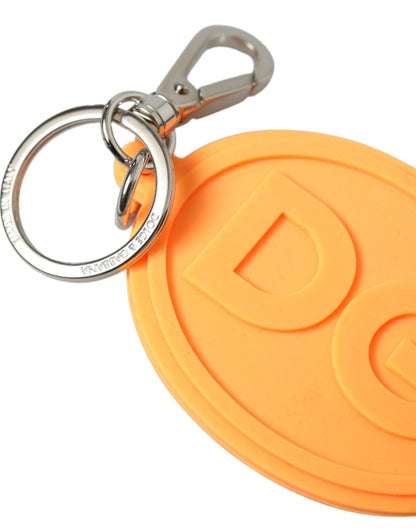 Dolce &amp; Gabbana Schlüsselanhänger mit DG-Logo aus orangefarbenem Gummi und silbernem Messingmetall
