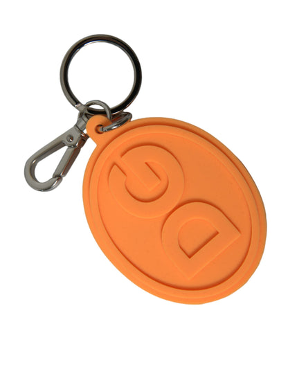 Dolce &amp; Gabbana Schlüsselanhänger mit DG-Logo aus orangefarbenem Gummi und silbernem Messingmetall