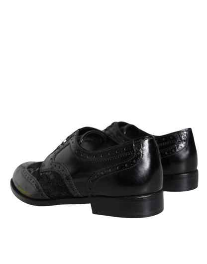 Dolce &amp; Gabbana – Formelle Schuhe aus schwarzem Leder mit floraler Spitze