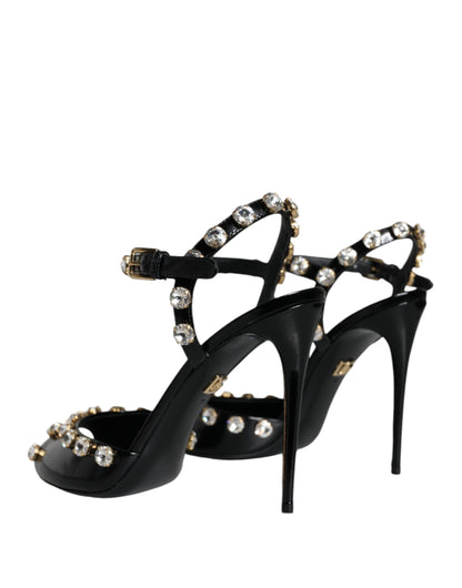 Dolce &amp; Gabbana Schwarze Ledersandalen mit Knöchelriemen und Kristallen