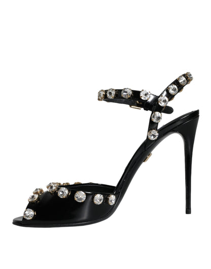 Dolce &amp; Gabbana Schwarze Ledersandalen mit Knöchelriemen und Kristallen