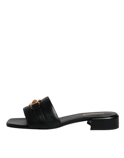Versace – Schwarze Slipper aus Leder mit Logo-Schild