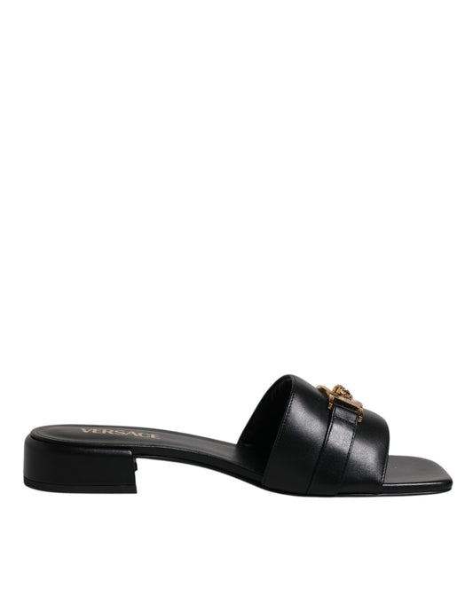 Versace – Schwarze Slipper aus Leder mit Logo-Schild