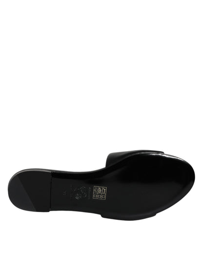Versace – Schwarze Slipper aus Leder mit Logo-Schild