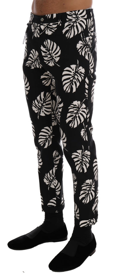 Dolce &amp; Gabbana – Schmale Hose aus Baumwollstretch in Weiß und Schwarz mit Blattmuster