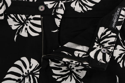 Dolce &amp; Gabbana – Schmale Hose aus Baumwollstretch in Weiß und Schwarz mit Blattmuster